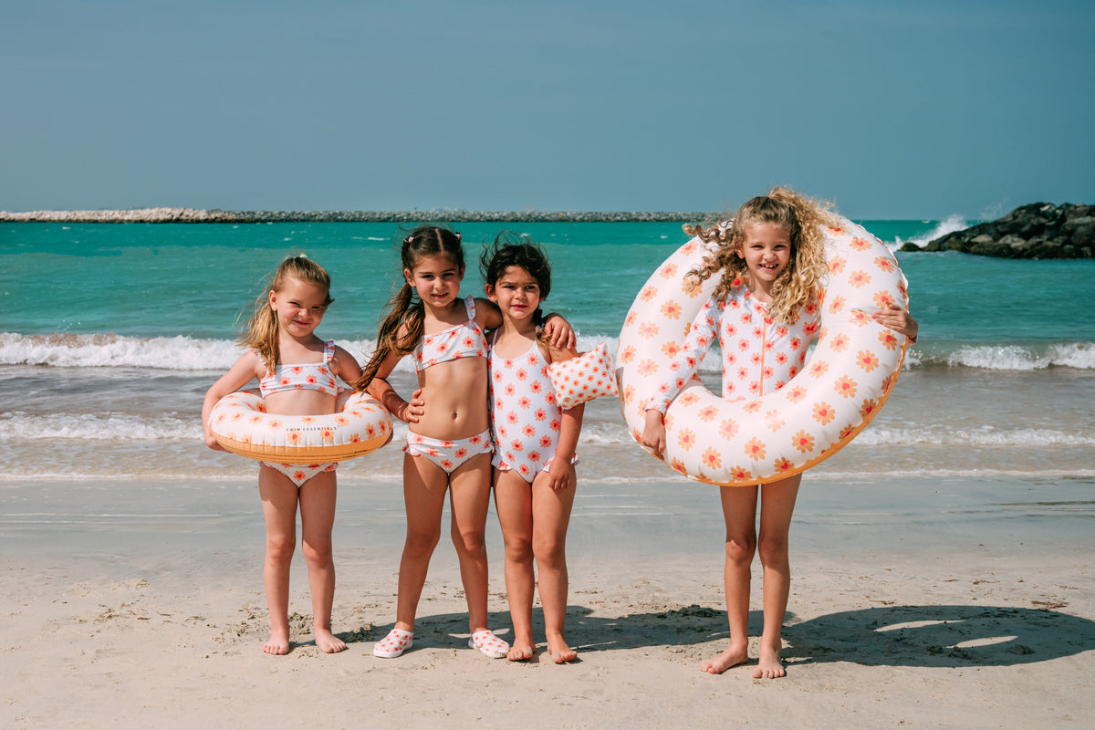 Kids in matching swimwear
